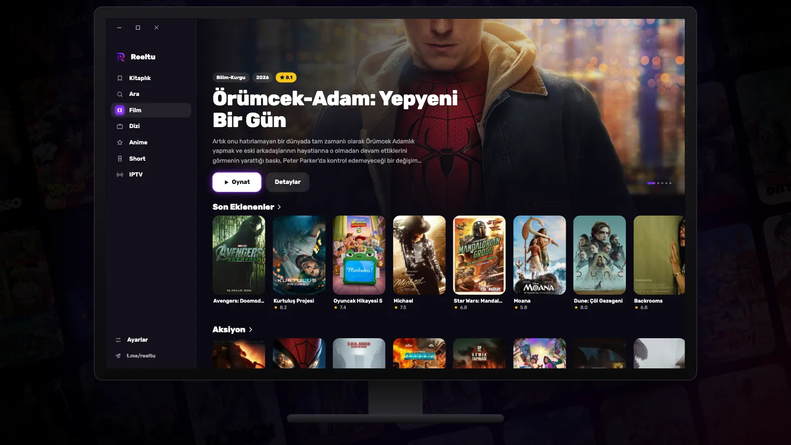 Film afişi satırlarıyla Reeltu uygulamasını gösteren bir Windows monitörü.
